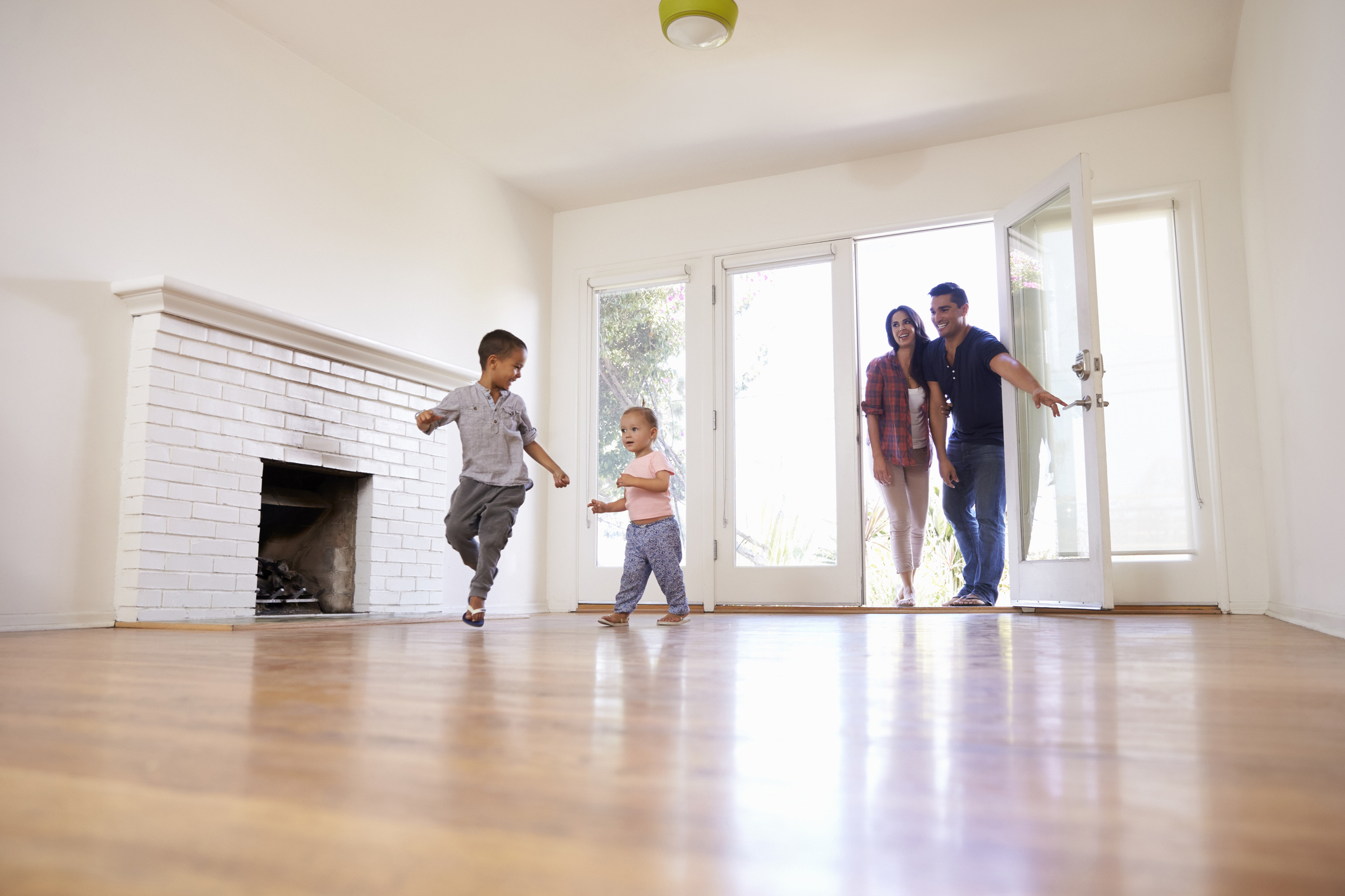 Family entering empty house
